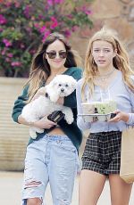 DAKOTA JOHNSON Out with Her Dog in Malibu 05/04/2019