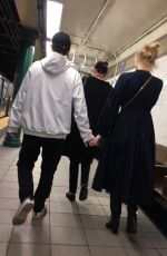 ELLE FANNING and Max Minghella Takes Subway in New York 05/04/2019