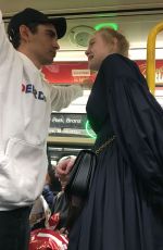 ELLE FANNING and Max Minghella Takes Subway in New York 05/04/2019