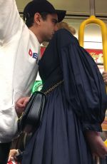 ELLE FANNING and Max Minghella Takes Subway in New York 05/04/2019