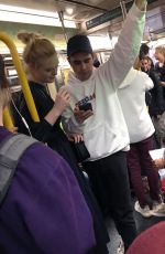 ELLE FANNING and Max Minghella Takes Subway in New York 05/04/2019