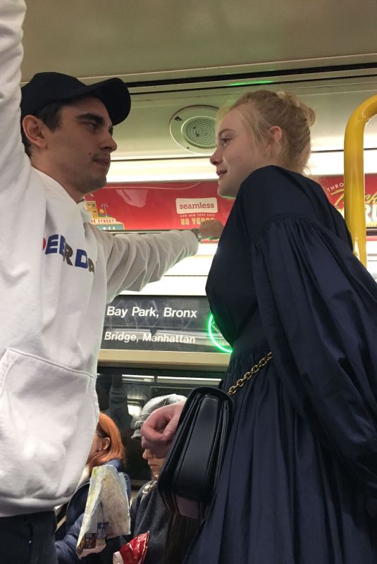 ELLE FANNING and Max Minghella Takes Subway in New York 05/04/2019