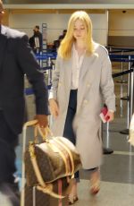 ELLE FANNING at Los Angeles International Airport 05/11/2019