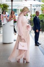 ELLE FANNING Leaves Hotel Martinez in Cannes 05/23/2019