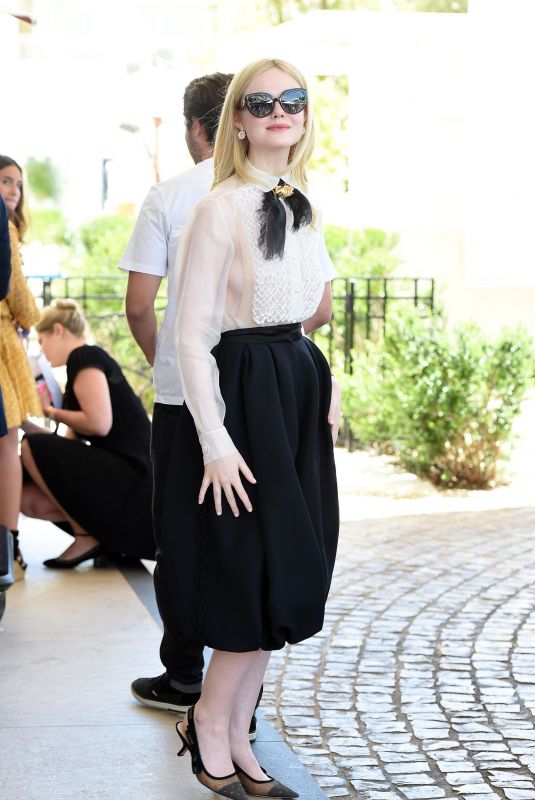 ELLE FANNING Leaves Martinez Hotel in Cannes 05/14/2019