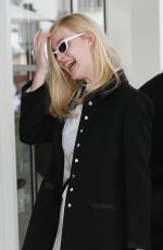 ELLE FANNING Leaves Martinez Hotel in Cannes 05/20/2019