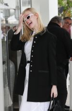 ELLE FANNING Leaves Martinez Hotel in Cannes 05/20/2019