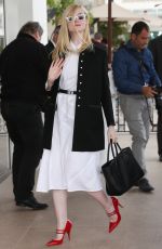ELLE FANNING Leaves Martinez Hotel in Cannes 05/20/2019