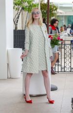 ELLE FANNING Leaves Martinez Hotel in Cannes 05/21/2019