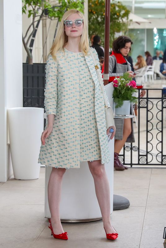 ELLE FANNING Leaves Martinez Hotel in Cannes 05/21/2019
