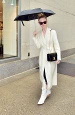 ELLE FANNING Out in the Rain in New York 05/05/2019