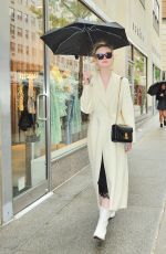 ELLE FANNING Out in the Rain in New York 05/05/2019
