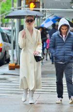 ELLE FANNING Out in the Rain in New York 05/05/2019