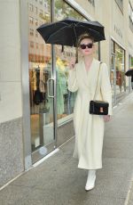 ELLE FANNING Out in the Rain in New York 05/05/2019