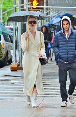 ELLE FANNING Out in the Rain in New York 05/05/2019