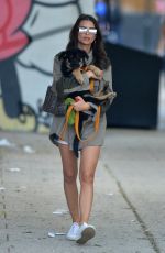 EMILY RATAJKOWSKI Carrying Her Dog Out in New York 05/24/2019