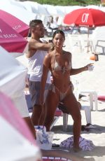 ERIKA WHEATON in Bikini at a Beach in Miami 05/11/2019