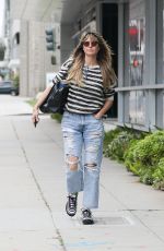 HEIDI KLUM in Ripped Denim Out in Beverly Hills 05/07/2019