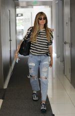 HEIDI KLUM in Ripped Denim Out in Beverly Hills 05/07/2019