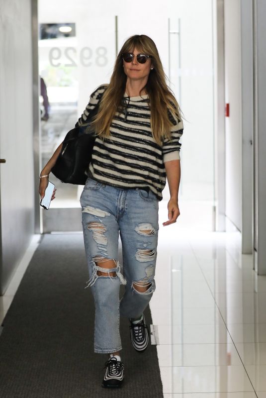 HEIDI KLUM in Ripped Denim Out in Beverly Hills 05/07/2019