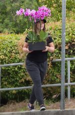 JENNIFER LOVE HEWITT Carries Some Flowers Out in Los Angeles 05/12/2019