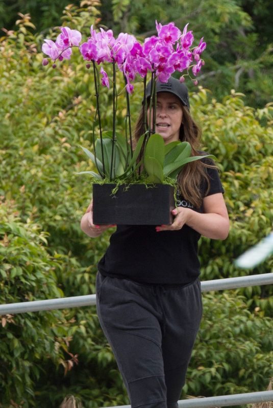 JENNIFER LOVE HEWITT Carries Some Flowers Out in Los Angeles 05/12/2019