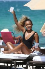 KARRUECHE TRAN in Swimsuit on the Beach in Miami 05/13/2019