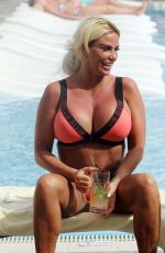 KATIE PRICE in Bikini at a Pool in Turkey 05/16/2019