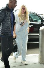 KESHA Arrives at LAX Airport in Los Angeles 05/08/2019