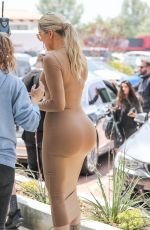 KIM and KHLOE KARDASHIAN in Bodycon Dresses Out in Malibu 05/03/2019