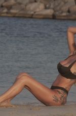 LAURA ANDERSON in Bikinis on the Beach in Dubai 05/12/2019