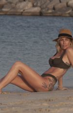 LAURA ANDERSON in Bikinis on the Beach in Dubai 05/12/2019