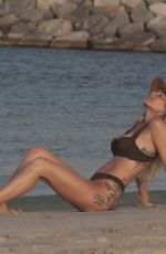 LAURA ANDERSON in Bikinis on the Beach in Dubai 05/12/2019