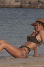 LAURA ANDERSON in Bikinis on the Beach in Dubai 05/12/2019