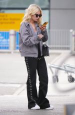 LOTTIE MOSS at Heathrow Airport in London 04/27/2019