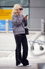 LOTTIE MOSS at Heathrow Airport in London 04/27/2019