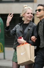 LUCY BOYNTON and Rami Malek Out Shopping in New York 04/29/2019