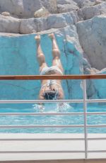 MICHELLE RODRIGUEZ in Bikini at Hotel Du Cap-eden-roc in Cannes 05/22/2019