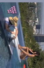 OLIVIA MUNN in Bikini at a Photoshoot - Instagram Pictures and Video 05/14/2019