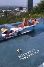 OLIVIA MUNN in Bikini at a Photoshoot - Instagram Pictures and Video 05/14/2019