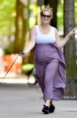 Pregnant AMY SCHUMER Out with Her Dog in New York 05/18/2019