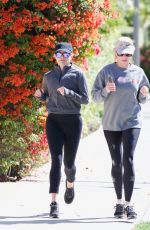 REESE WITHERSPOON Out Jogging with a Friend in Brentwood 05/27/2019