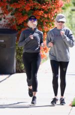 REESE WITHERSPOON Out Jogging with a Friend in Brentwood 05/27/2019