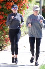 REESE WITHERSPOON Out Jogging with a Friend in Brentwood 05/27/2019