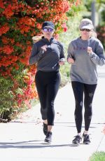 REESE WITHERSPOON Out Jogging with a Friend in Brentwood 05/27/2019