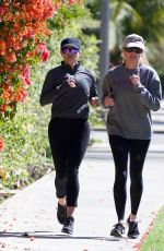 REESE WITHERSPOON Out Jogging with a Friend in Brentwood 05/27/2019