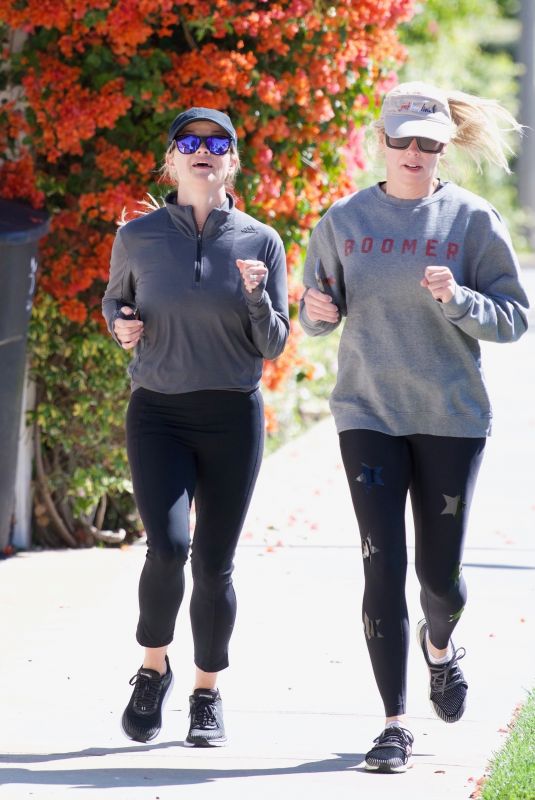 REESE WITHERSPOON Out Jogging with a Friend in Brentwood 05/27/2019