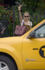 SIENNA MILLER Hailing a Taxi Out in New York 05/29/2019