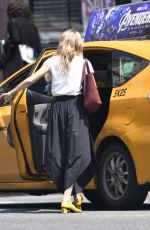 SIENNA MILLER Hails a Taxi in New York 05/02/2019