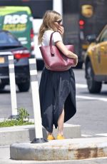 SIENNA MILLER Hails a Taxi in New York 05/02/2019